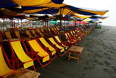 Thousands of beach chairs lined up in Cuyutlán, and not a single person using them.